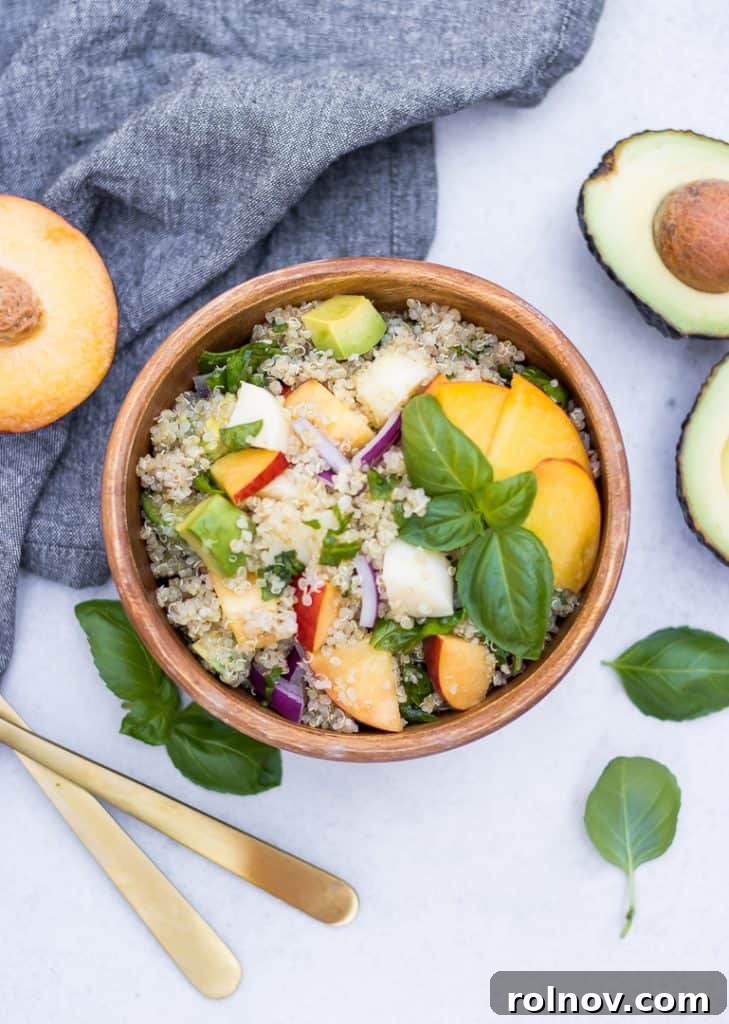 10 Effortless Summer Salads and Sides for Every BBQ 2 Sweet and savory Avocado Peach Caprese Salad with basil and mozzarella, a seasonal delight.