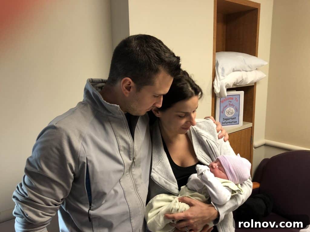 Our Adoption Story Continues 4 Our first family photo with Samuel Noah, held by Hope, his birth mother, marking the beginning of our new family.