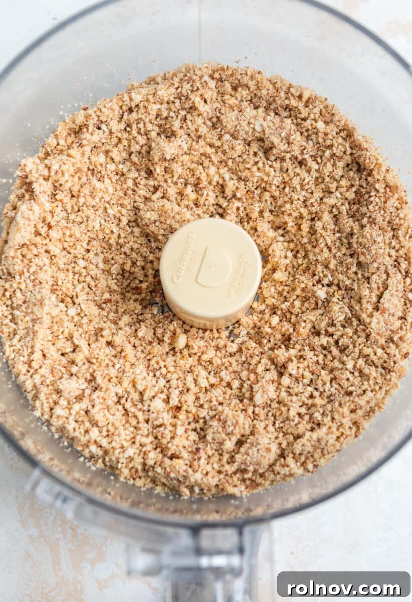 Ground almonds, oats and walnuts in food processor.