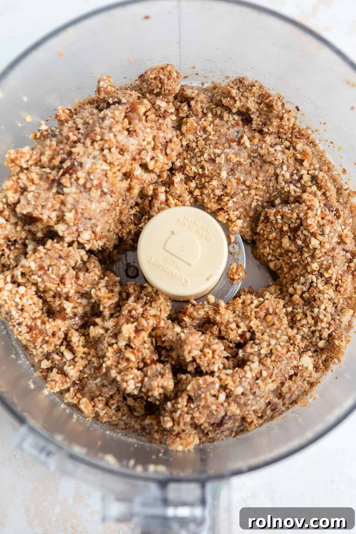 Banana bread bite mixture in food processor.