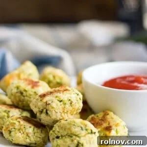 Delicious Cheesy Zucchini Tots, a perfect healthy snack or side for families.