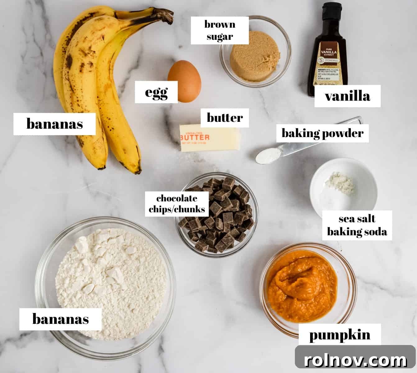 Pumpkin Speckled Banana Bread 4 Ingredients labeled on counter for pumpkin chocolate chip banana bread.