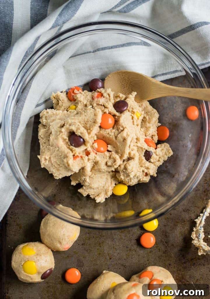 Peanut Butter Cookie Dough Nuggets 3 Close-up of fluffy, delicious edible peanut butter cookie dough with scattered Reese's Pieces.