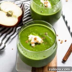 Green Dream Apple Pie Smoothie 6 A vibrant green apple smoothie in a glass.