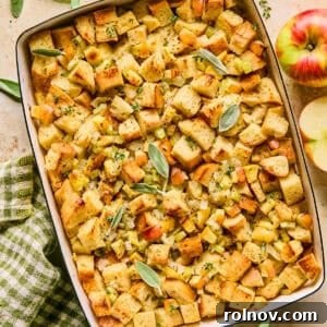 Pan with apple stuffing topped with herbs.