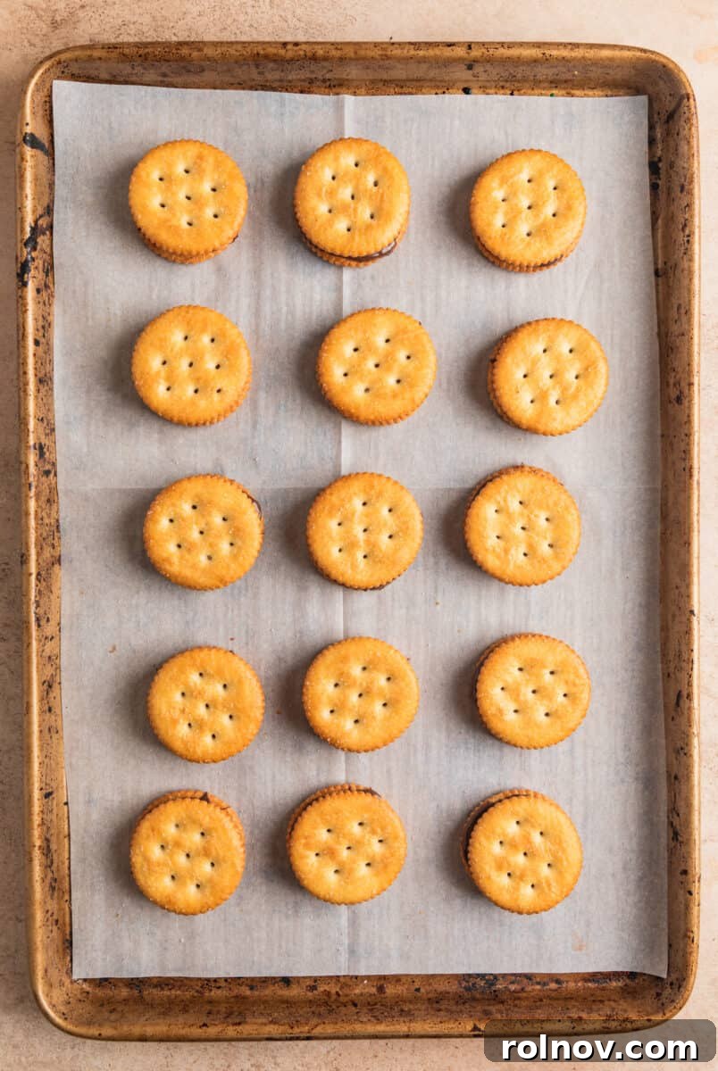 Ritz cracker cookies on cookie sheet.