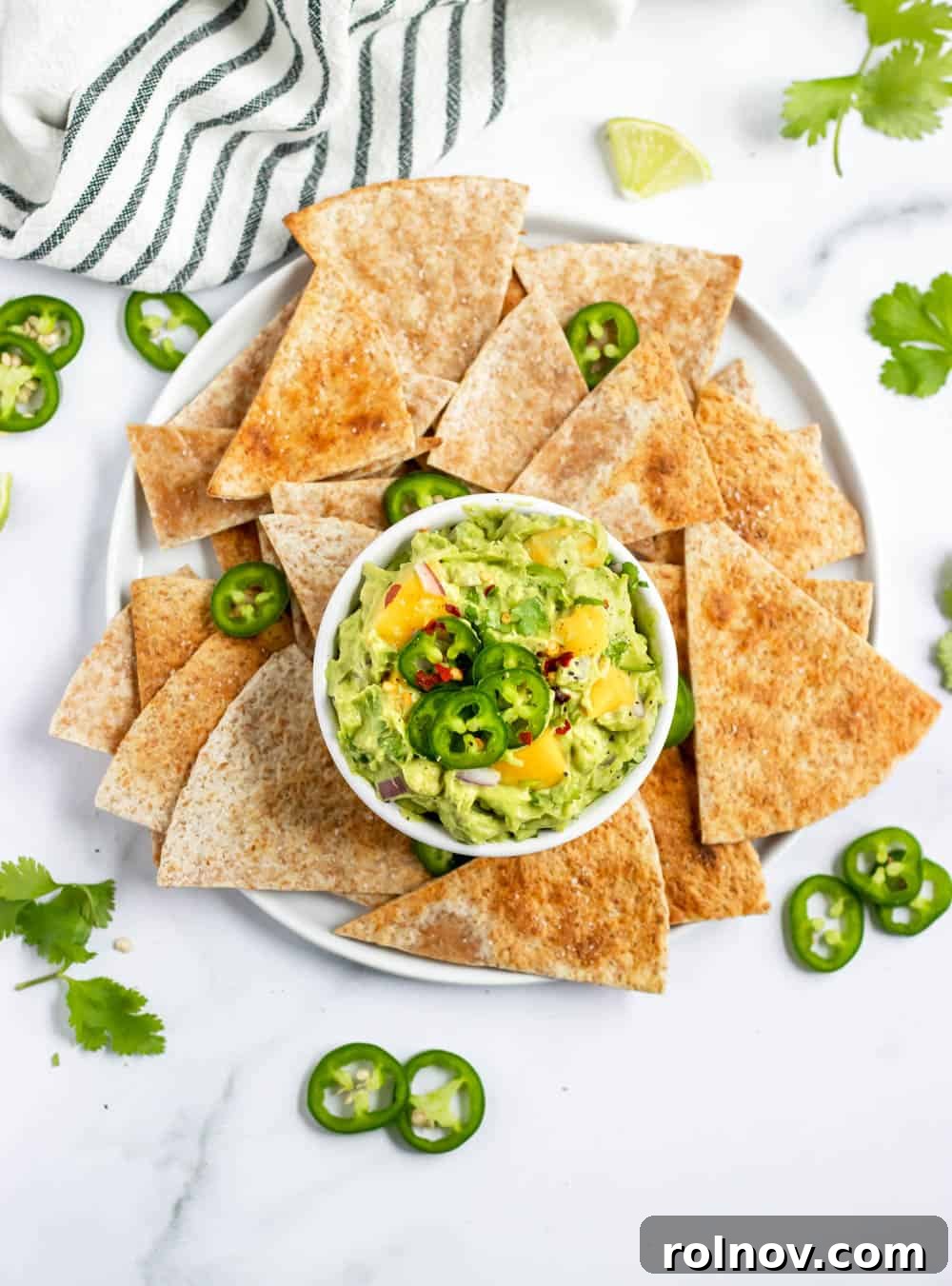Fiery Mango Guac 2 Vibrant Spicy Mango Guacamole served in a bowl, ready for dipping