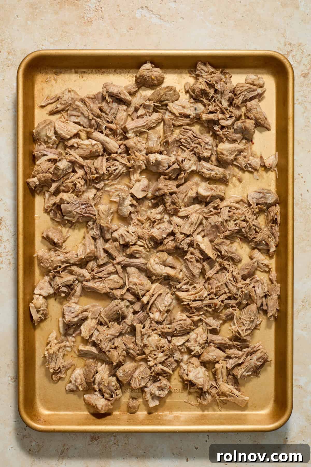 Lightning-Fast Crispy Instant Pot Carnitas 8 Sheet pan with shredded pork.