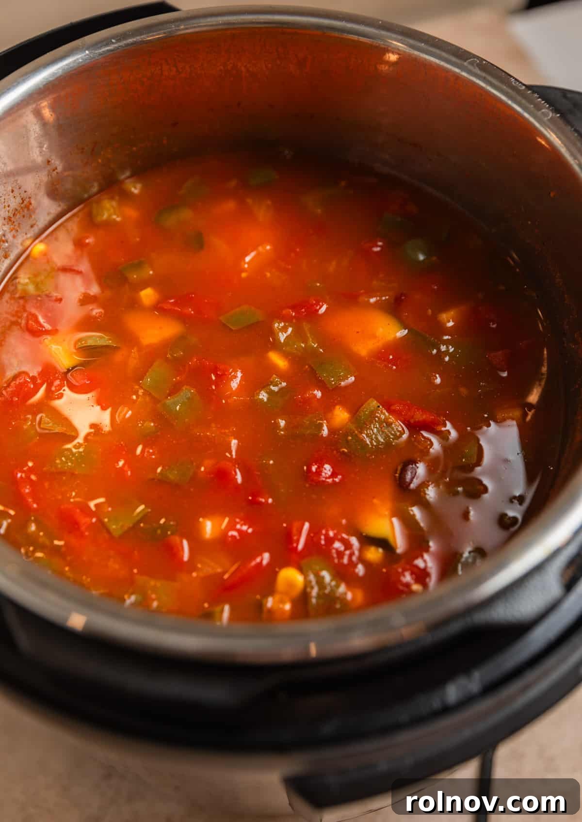 Ultimate Instant Pot Chicken Tortilla Soup 7 Chicken tortilla soup in Instant Pot after pressure cooking.