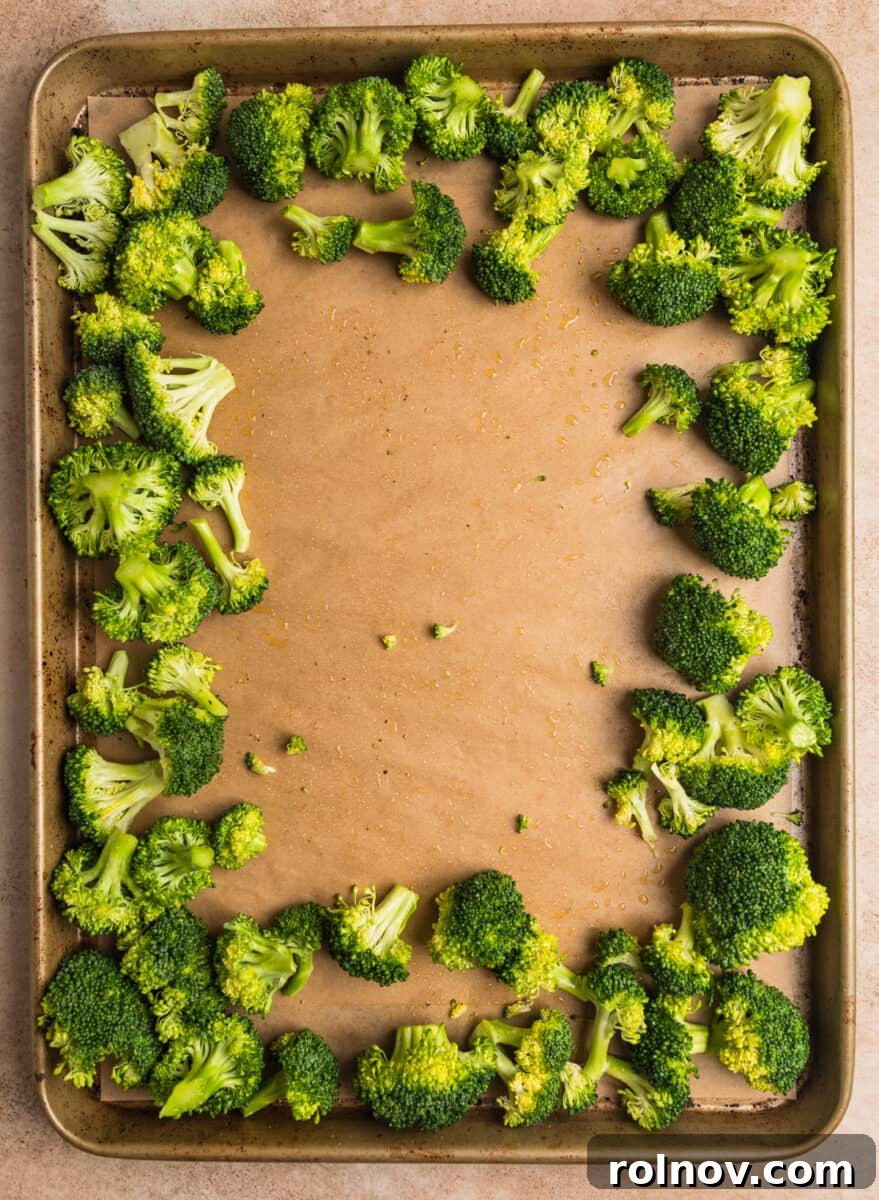 Sticky Orange Chicken One-Pan Dinner 8 Broccoli spread to the outer edges of baking sheet.