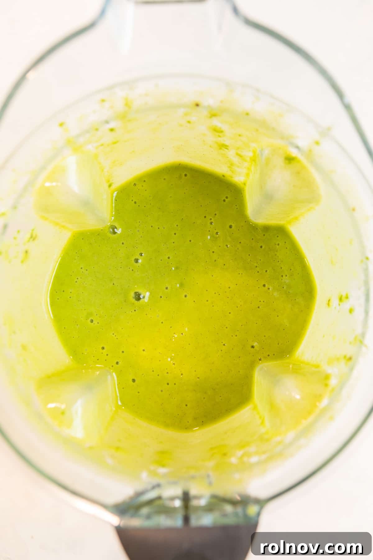Zesty Green Kiwi Pineapple Boost 4 Pineapple kiwi smoothie blended in blender.