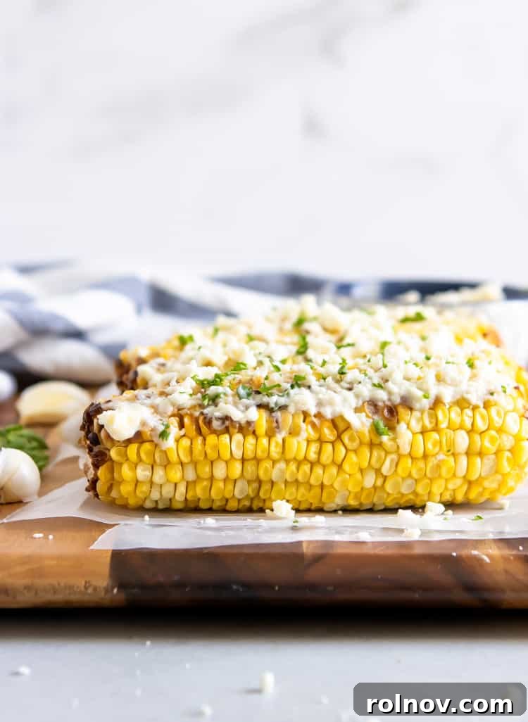 Garlic Feta Buttered Street Corn 3 Delicious grilled street corn smothered in garlic feta butter, perfect for summer picnics.