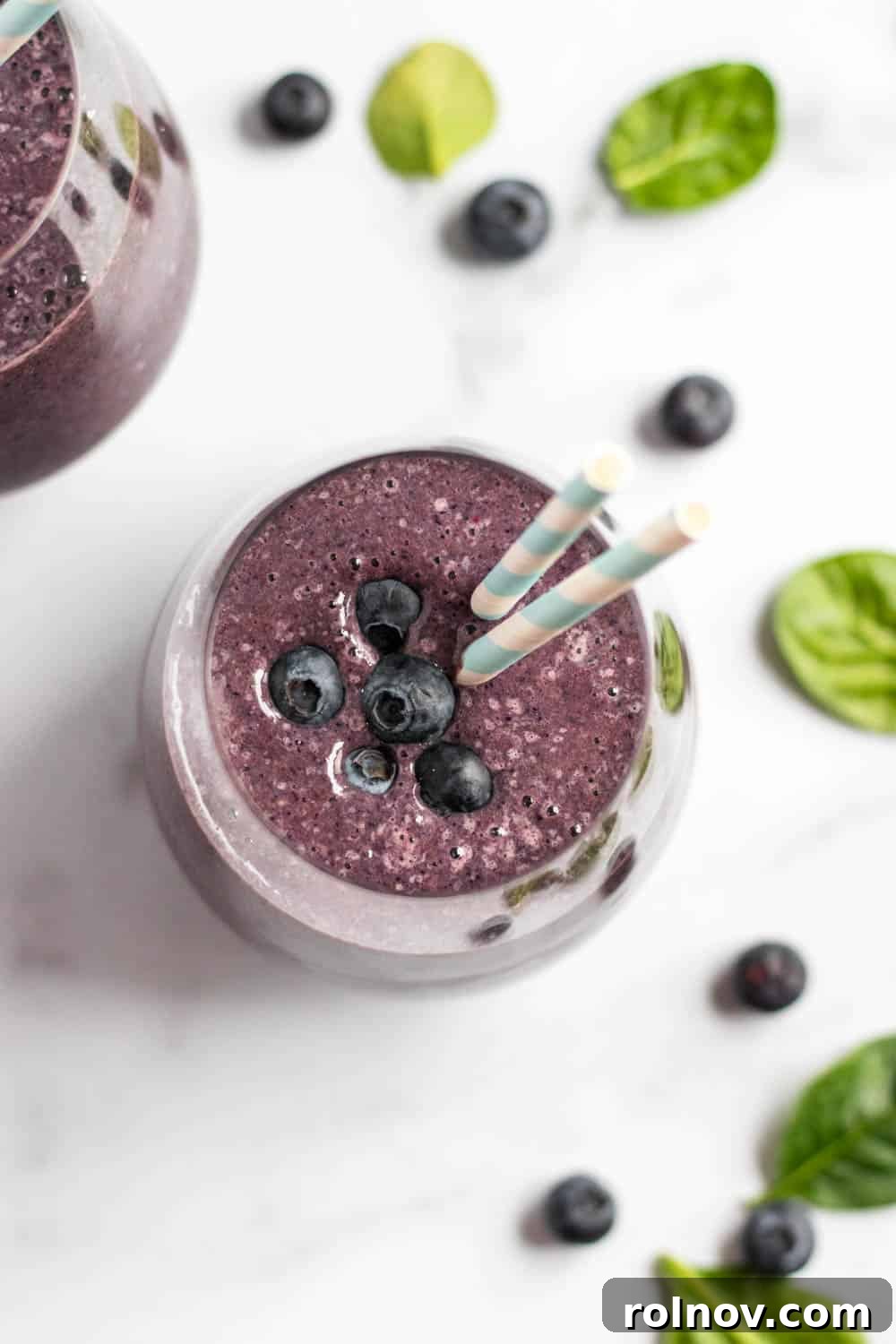 Inflammation-Fighting Blueberry Smoothie 3 Close-up of the Anti-Inflammatory Blueberry Smoothie, showcasing its rich purple color and smooth texture, with a natural background.