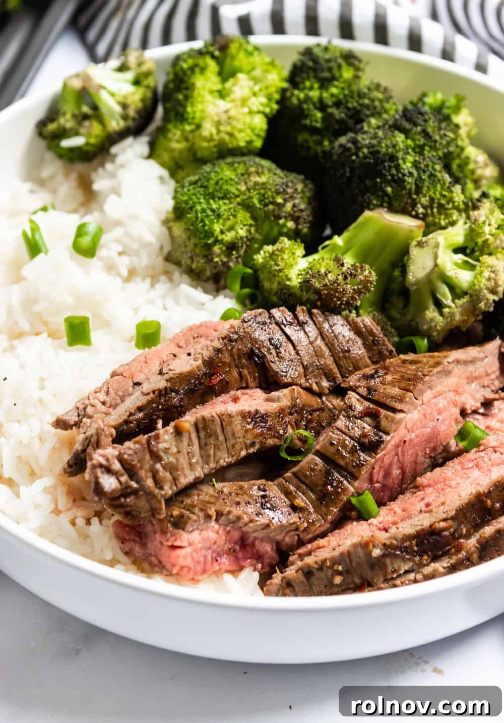 Speedy One-Pan Steak and Broccoli 2 15 Minute Marinated Sheet Pan Steak and Broccoli Dinner - A quick and easy recipe for juicy flank steak and crispy broccoli.