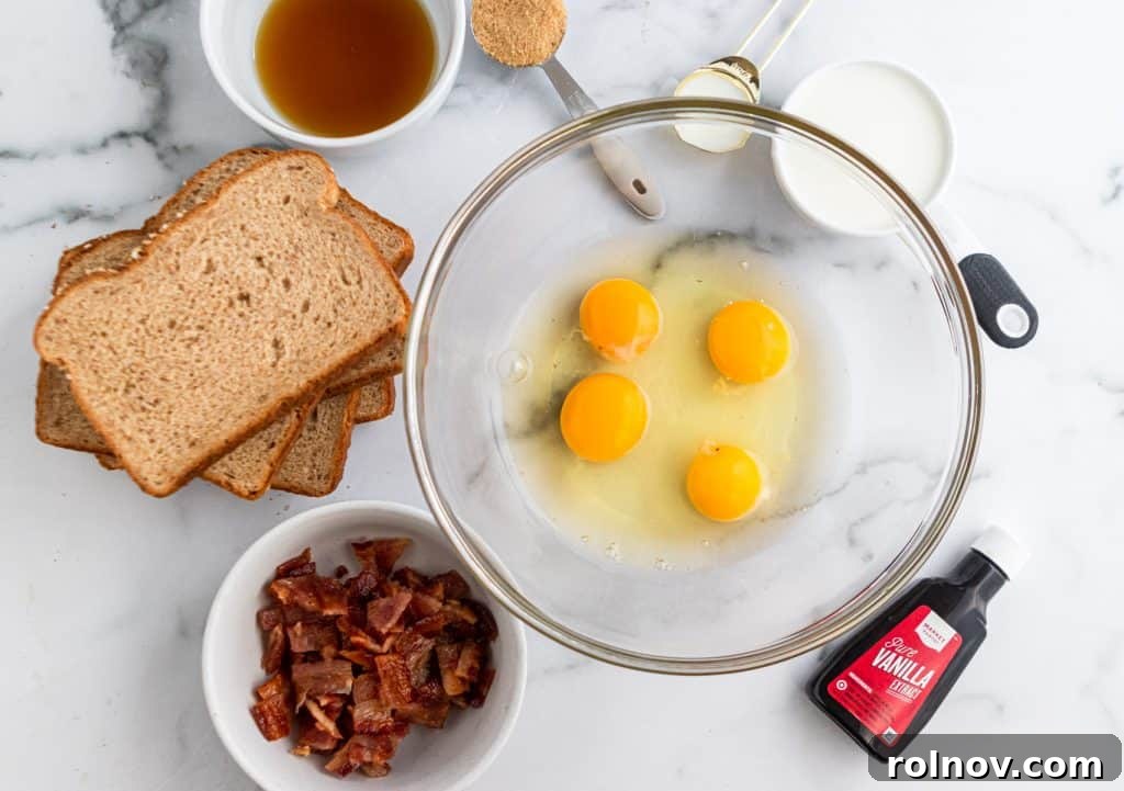 A collection of fresh ingredients laid out, including eggs, milk, bread, maple syrup, and bacon, all ready to be transformed into delicious Maple Bacon French Toast Muffins.
