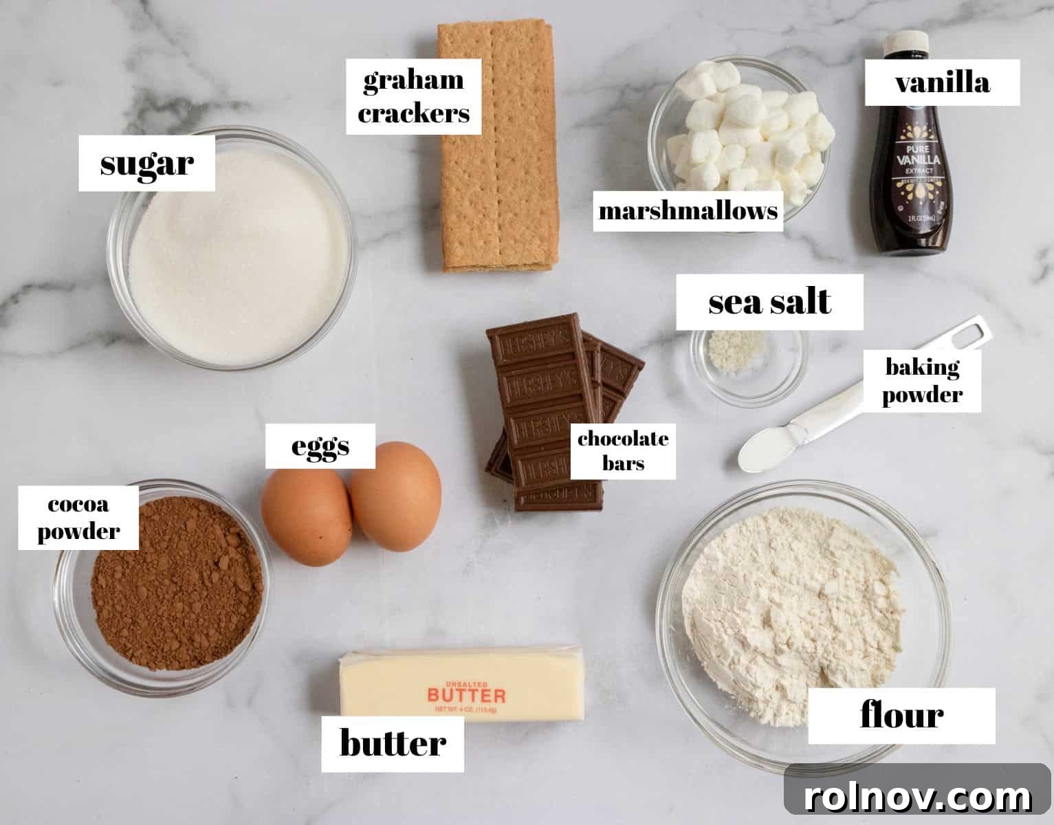 Gooey S'mores Skillet Brownie 3 Array of ingredients for making S'mores Brownie Skillet, neatly arranged on a kitchen counter.