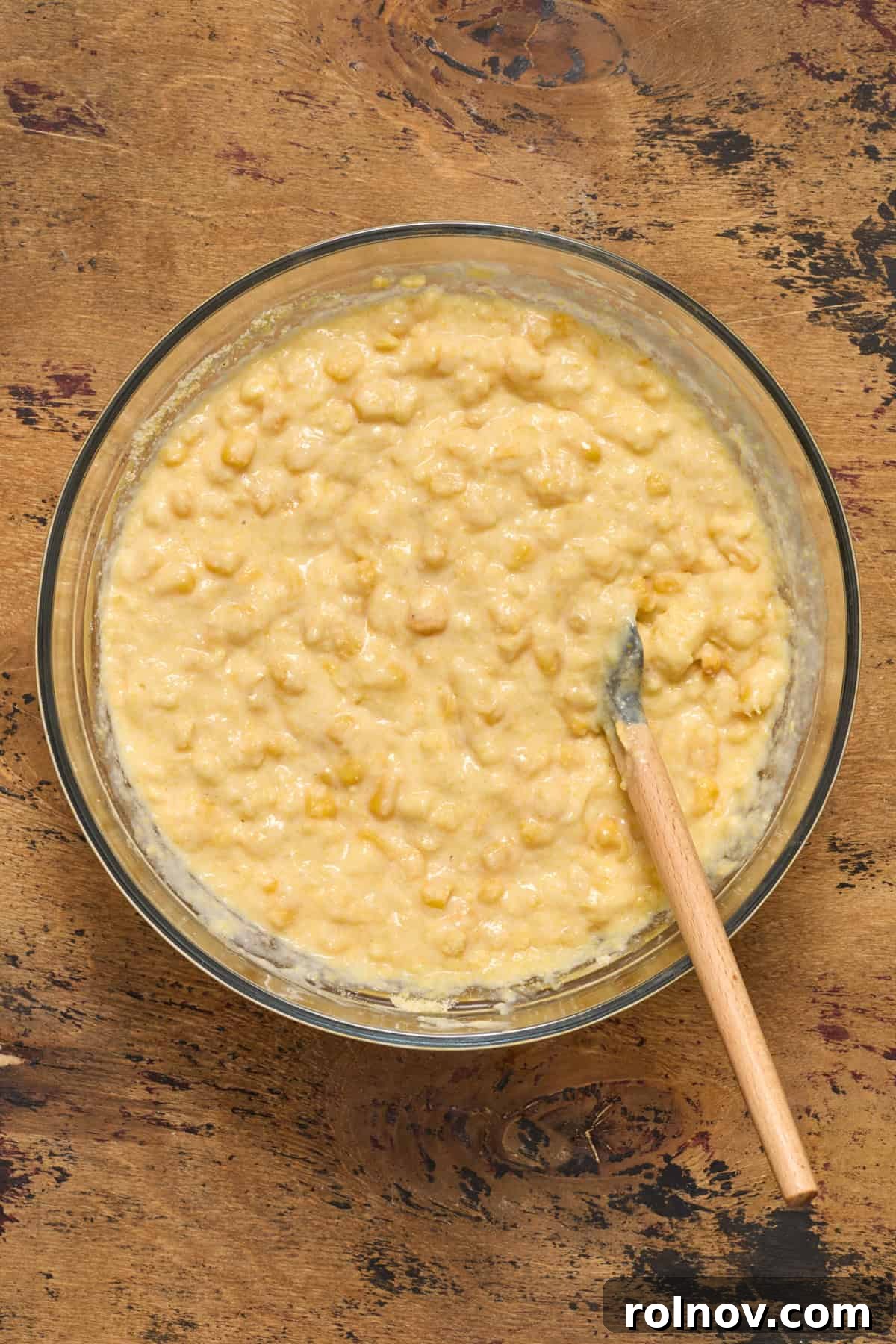 Golden Honey Cornbread Bake 8 Cornbread casserole mixture in bowl.