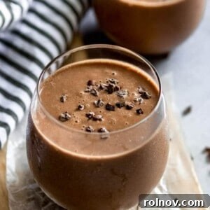 A vibrant Chocolate Banana Smoothie with a hint of cayenne, served in a glass, ready for a refreshing and invigorating sip.