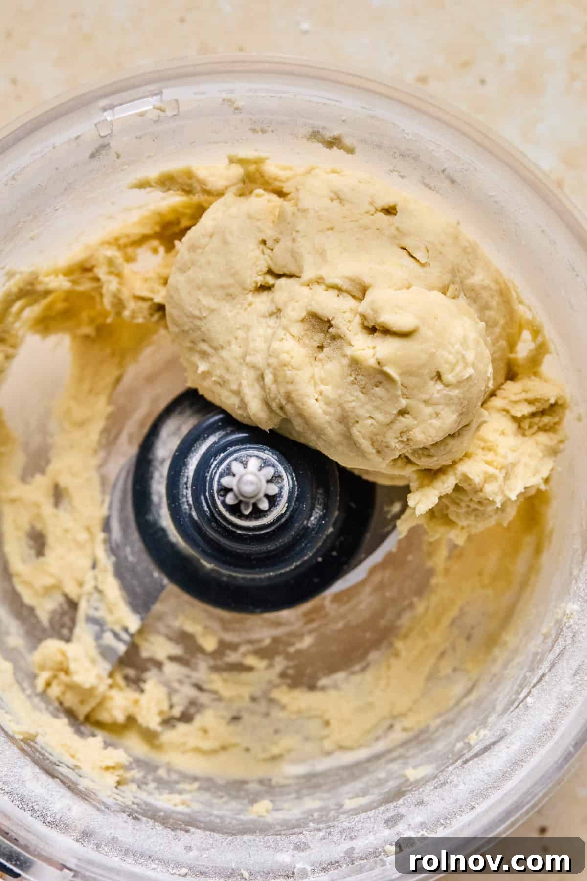 Crispy Air-Fried Blueberry Turnovers 7 A perfectly formed ball of pie crust dough inside the food processor.
