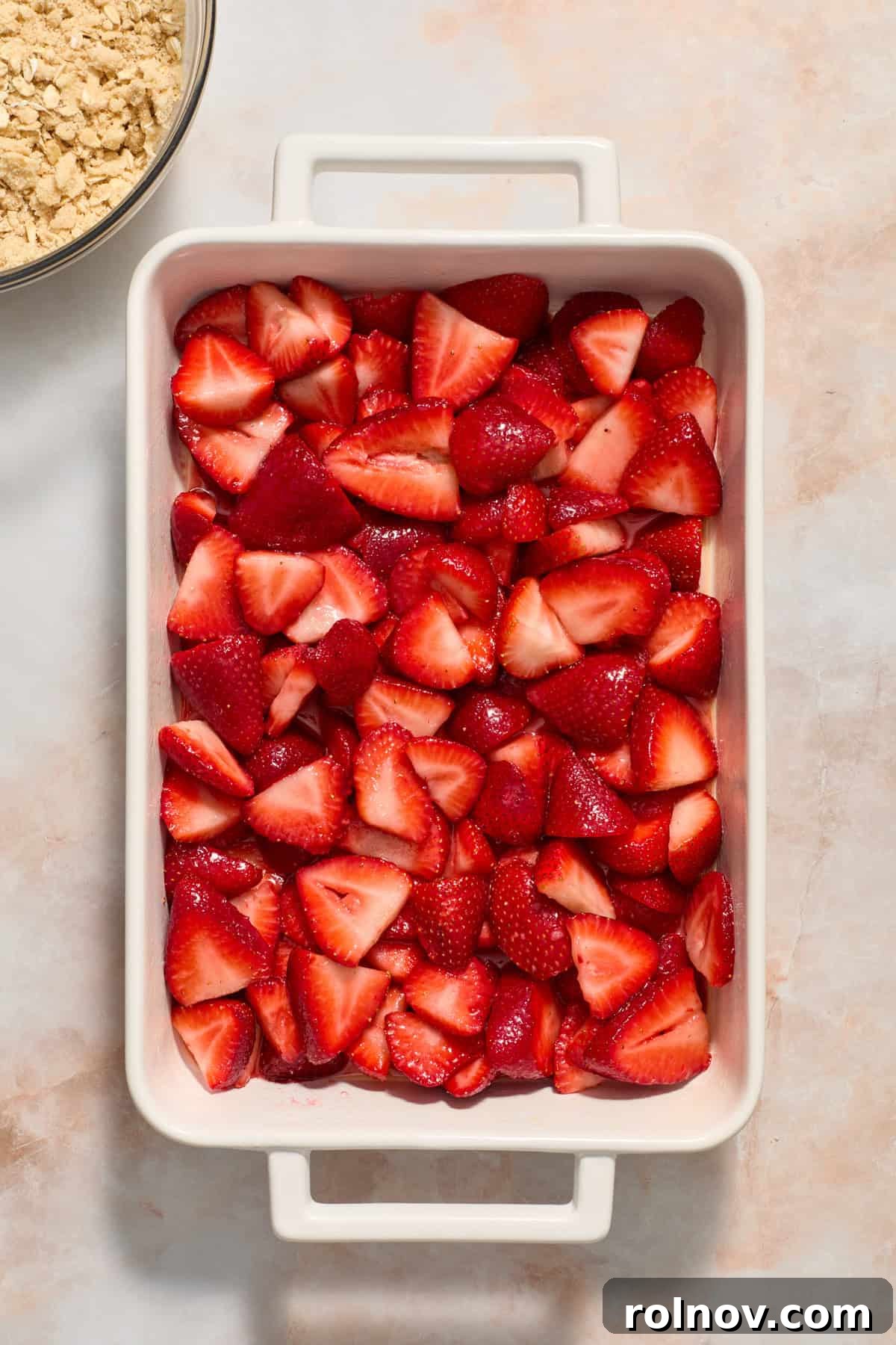 Crimson Crumble Dream 8 Strawberries tossed in sugar and corn starch in the bottom of baking pan.
