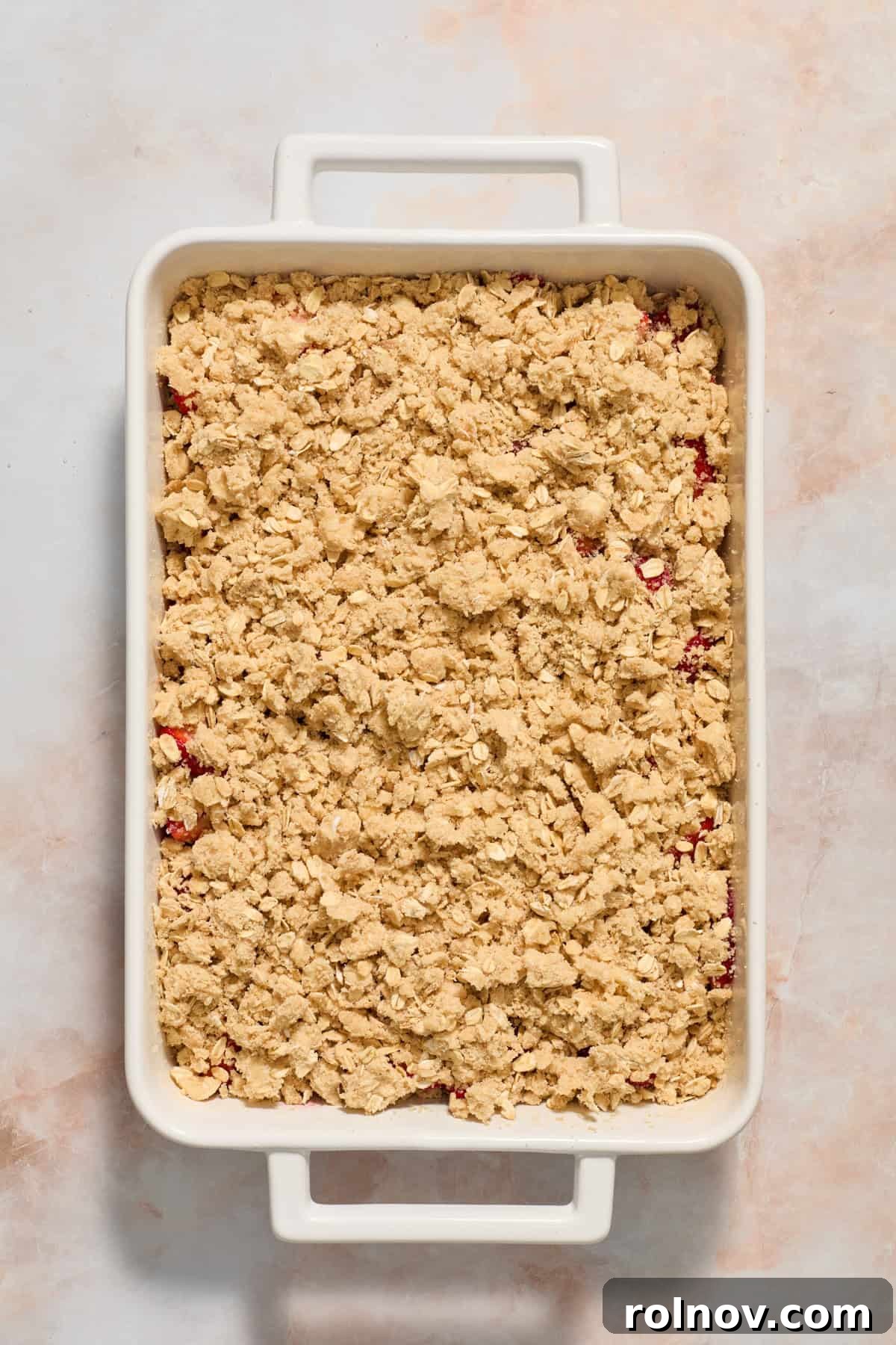 Crimson Crumble Dream 9 Crumble topping on strawberry layer before baking.