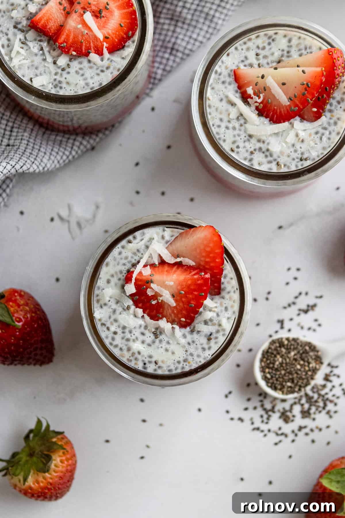 Creamy Coconut Vanilla Chia Pudding with Strawberries 6 Overhead photo of coconut vanilla pudding with berries in jar.