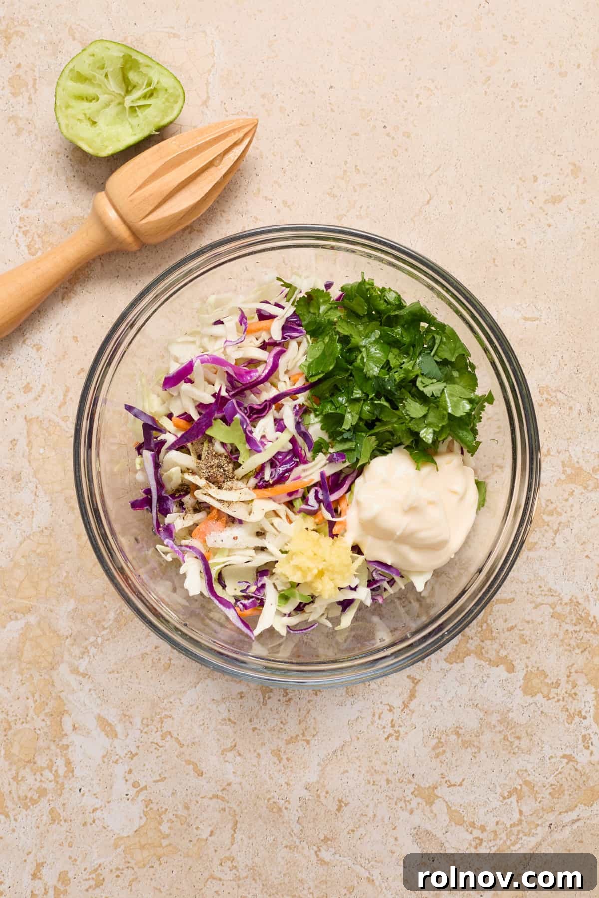 Crispy Air Fried Fish Tacos and Zesty Cilantro Lime Slaw 7 Cilantro lime slaw ingredients in glass mixing bowl.