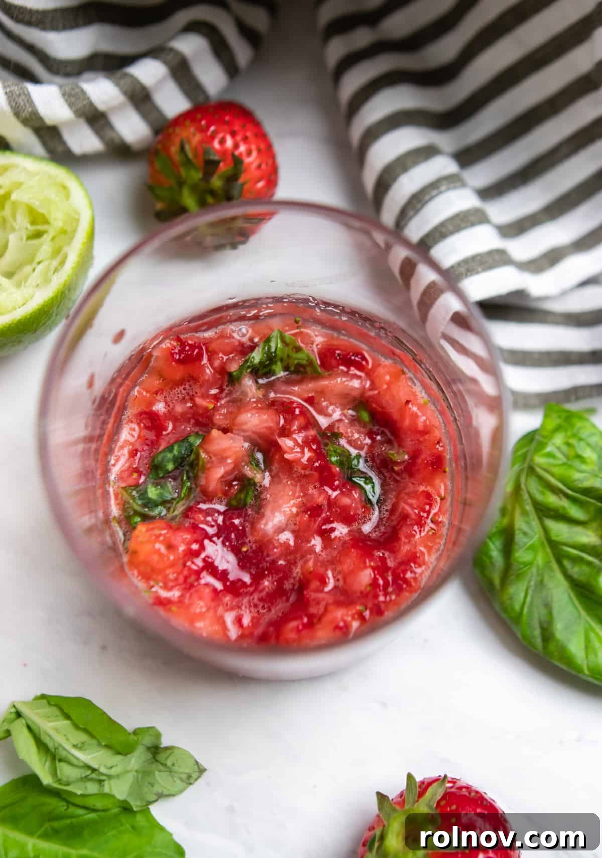 Garden Fresh Strawberry Basil Margarita 5 Muddled strawberries and basil.