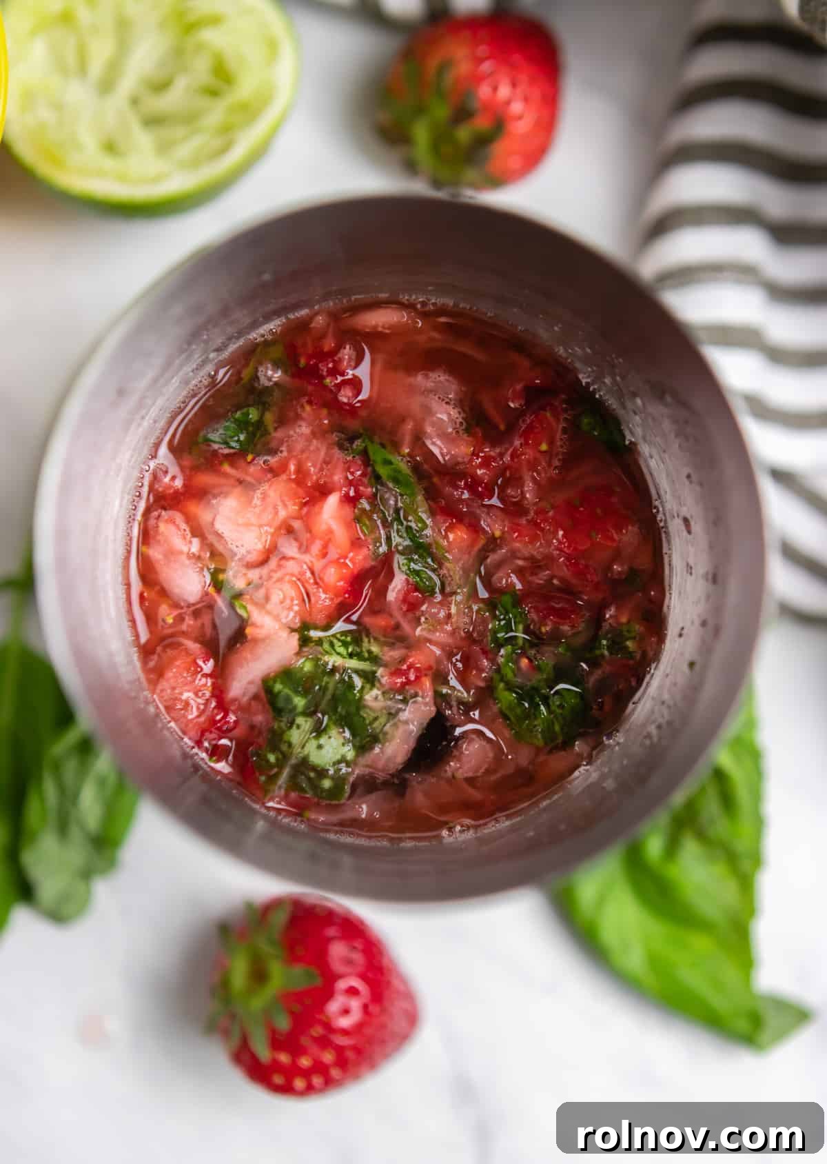 Garden Fresh Strawberry Basil Margarita 6 Strawberry basil margarita ingredients in cocktail mixer.