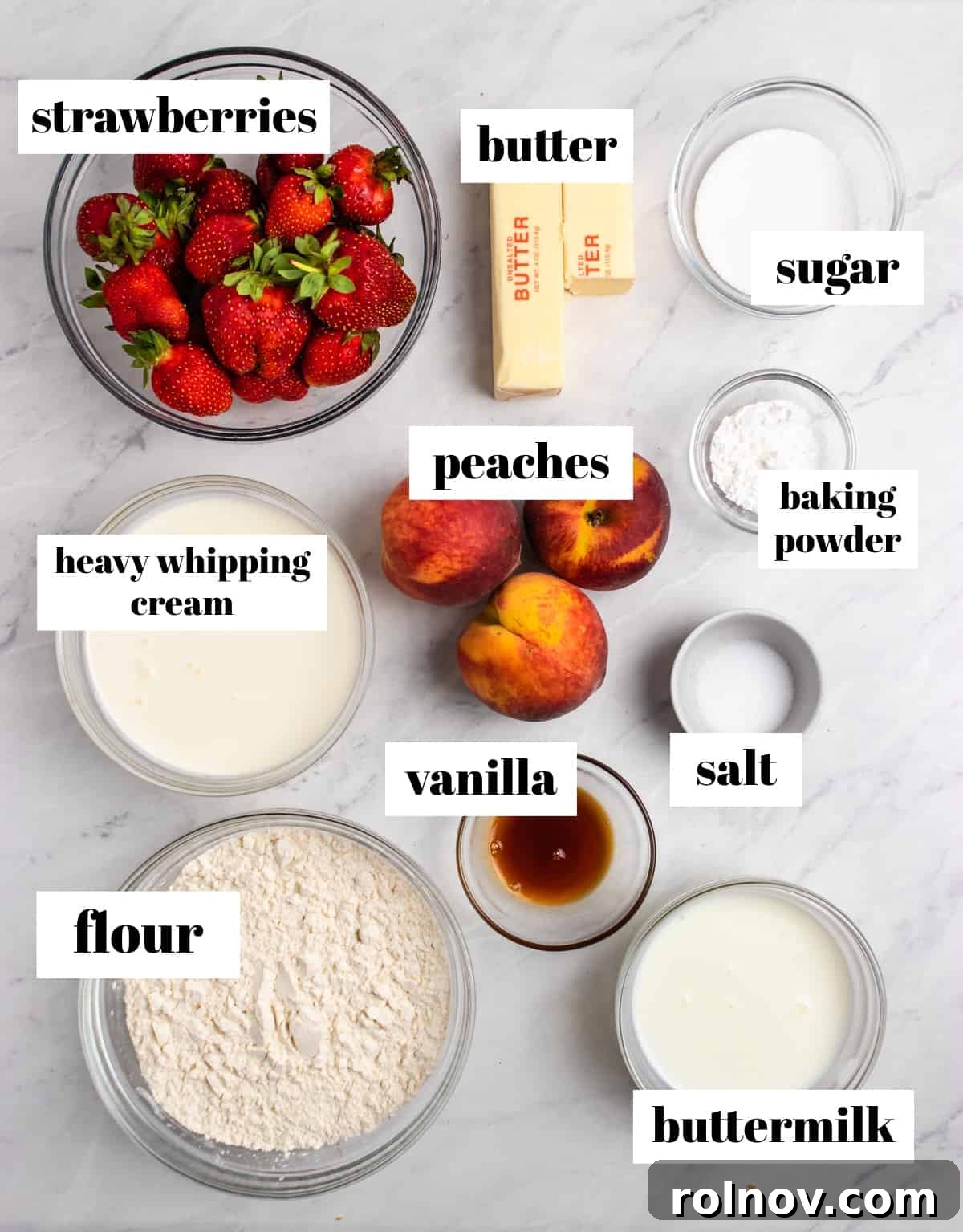 Sun-Kissed Peach Strawberry Shortcake 3 Flour, whipping cream, fruit, salt and other ingredients labeled on counter.