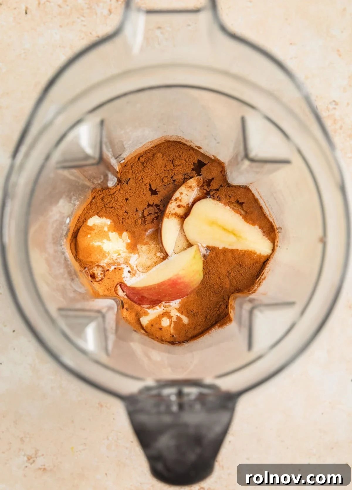 Spiced Apple Oat Pancakes 6 Apples, eggs, milk, cinnamon and other ingredients in blender, ready to be blended.