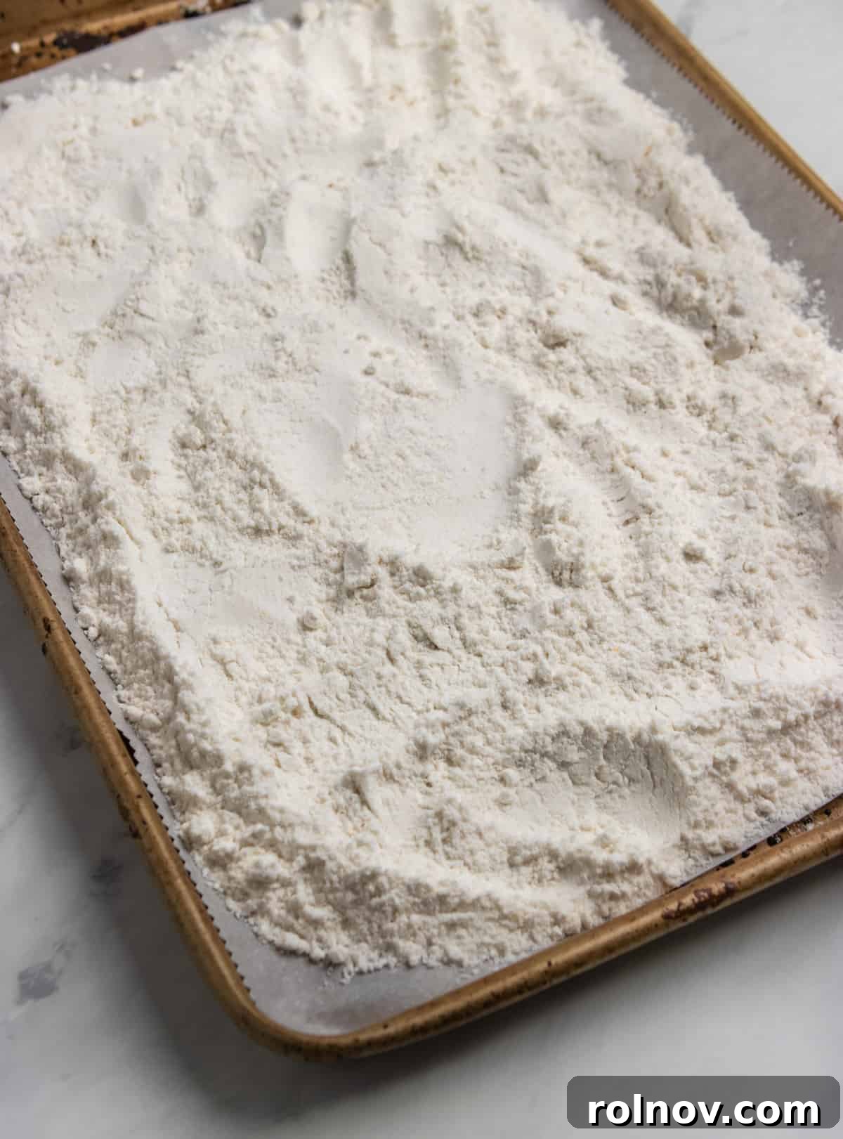 Celebration Funfetti Dip 5 Sheet pan with cake mix spread evenly over top.