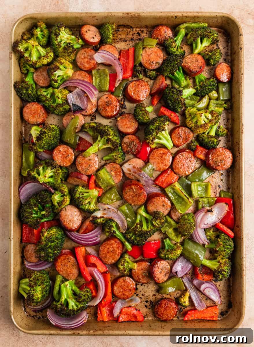 Roasted Sausage & Veggie Sheet Pan Supper 6 Cooked sausage and vegetable sheet pan dinner.
