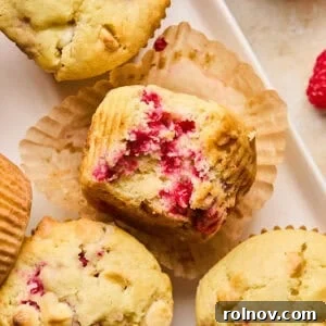 White chocolate raspberry muffin with fresh raspberries.