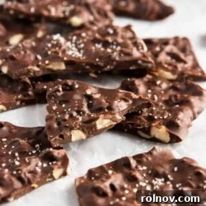 Delicious homemade dark chocolate almond bark thins with sea salt, ready to break and enjoy.