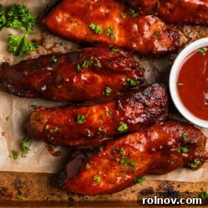Overhead view of tender air fryer country ribs covered in glistening BBQ sauce, ready to be served.