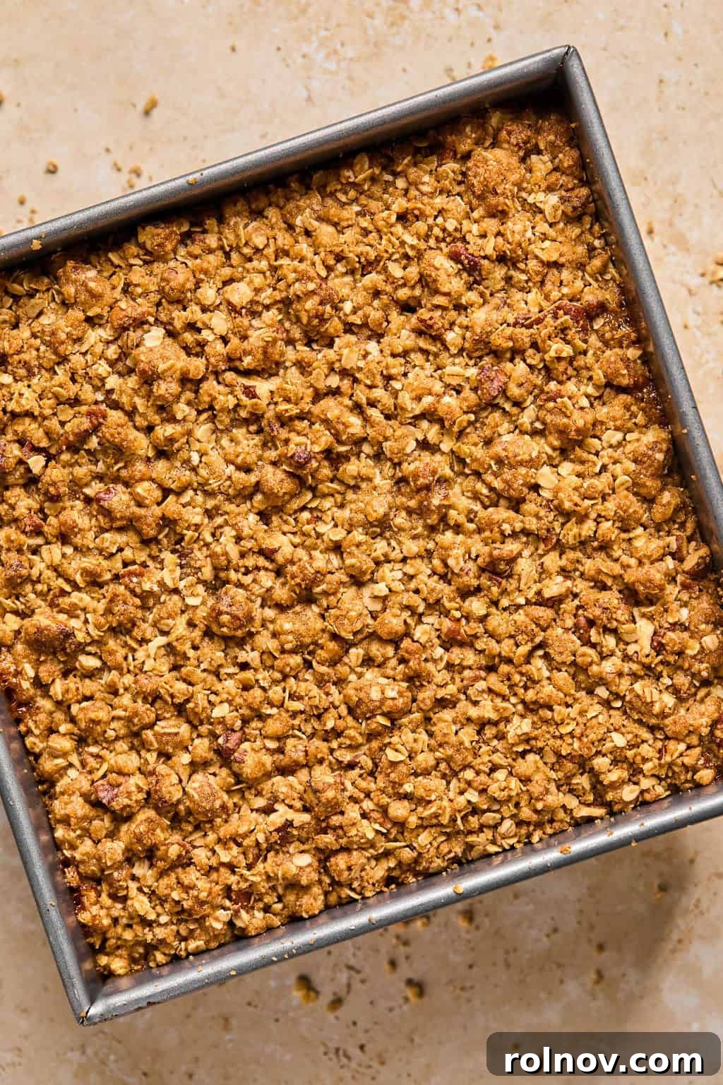 Spiced Pumpkin Crumble 12 Baked pumpkin pie crumble in pan fresh from the oven.