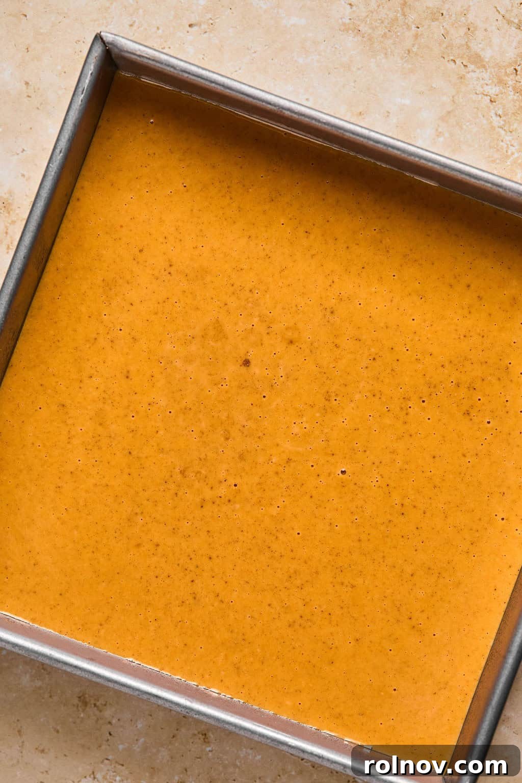 Spiced Pumpkin Crumble 7 Pumpkin layer in baking pan before baking.