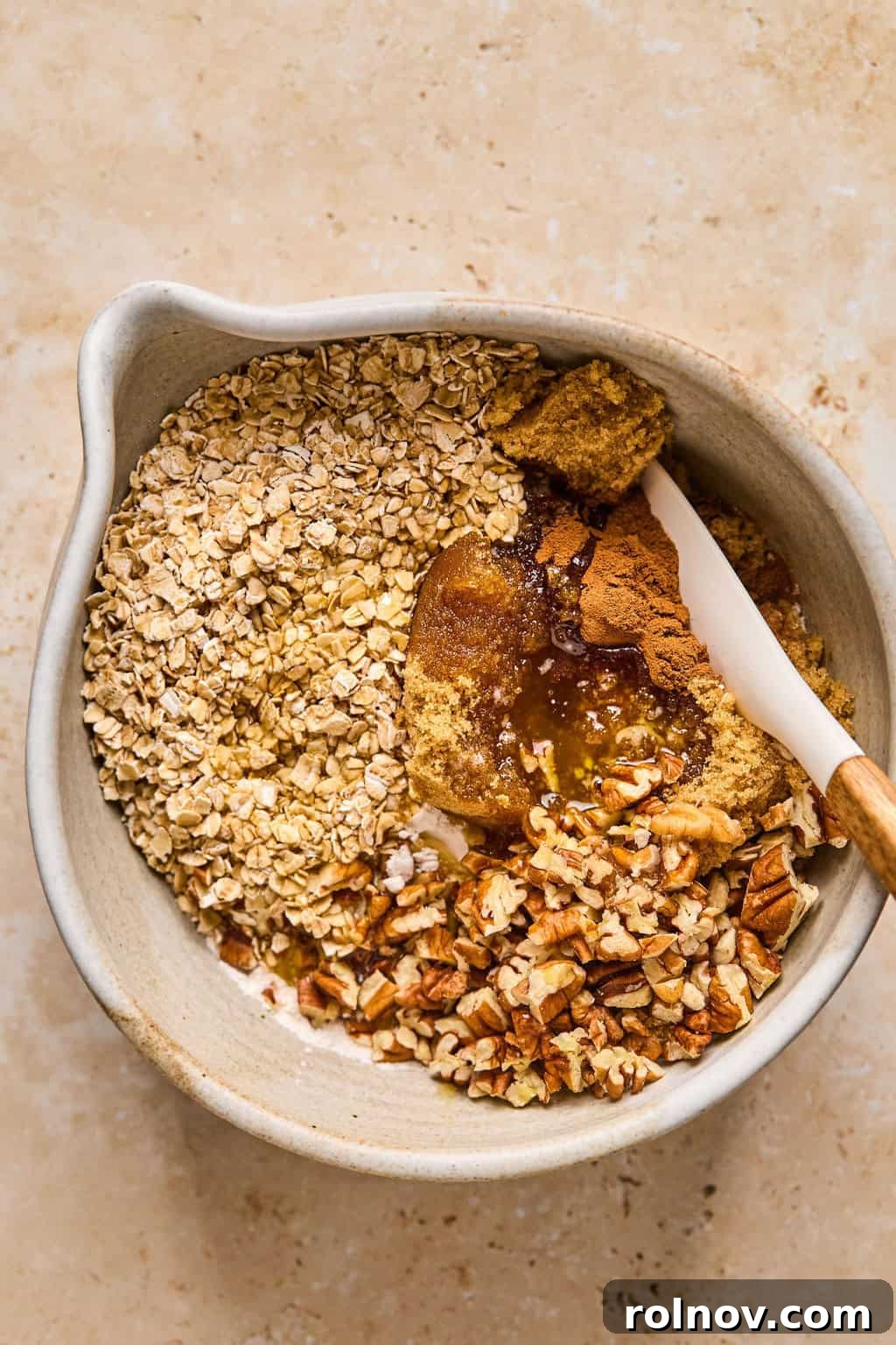 Spiced Pumpkin Crumble 8 Crumble or crisp topping ingredients in mixing bowl with spoon.