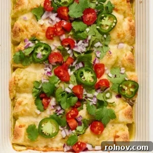 Zesty Verde Chicken Enchiladas 13 Pan of green chicken enchiladas topped with onion, cilantro, tomatoes, etc.