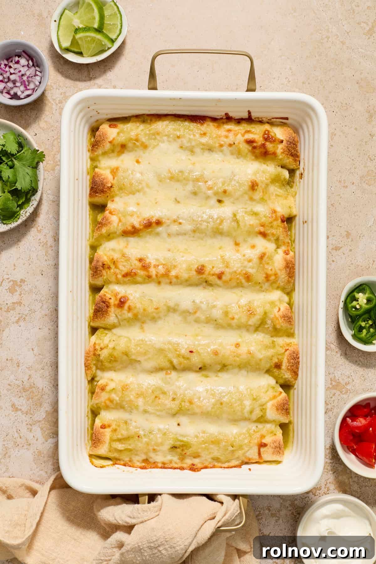 Zesty Verde Chicken Enchiladas 10 Baked green chicken enchiladas fresh from the oven.
