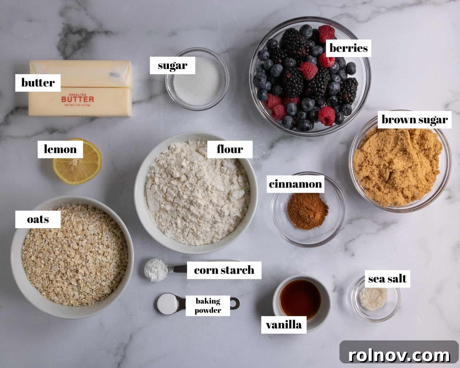 Golden Berry Crumble Bars 4 Ingredients labeled on white counter top.