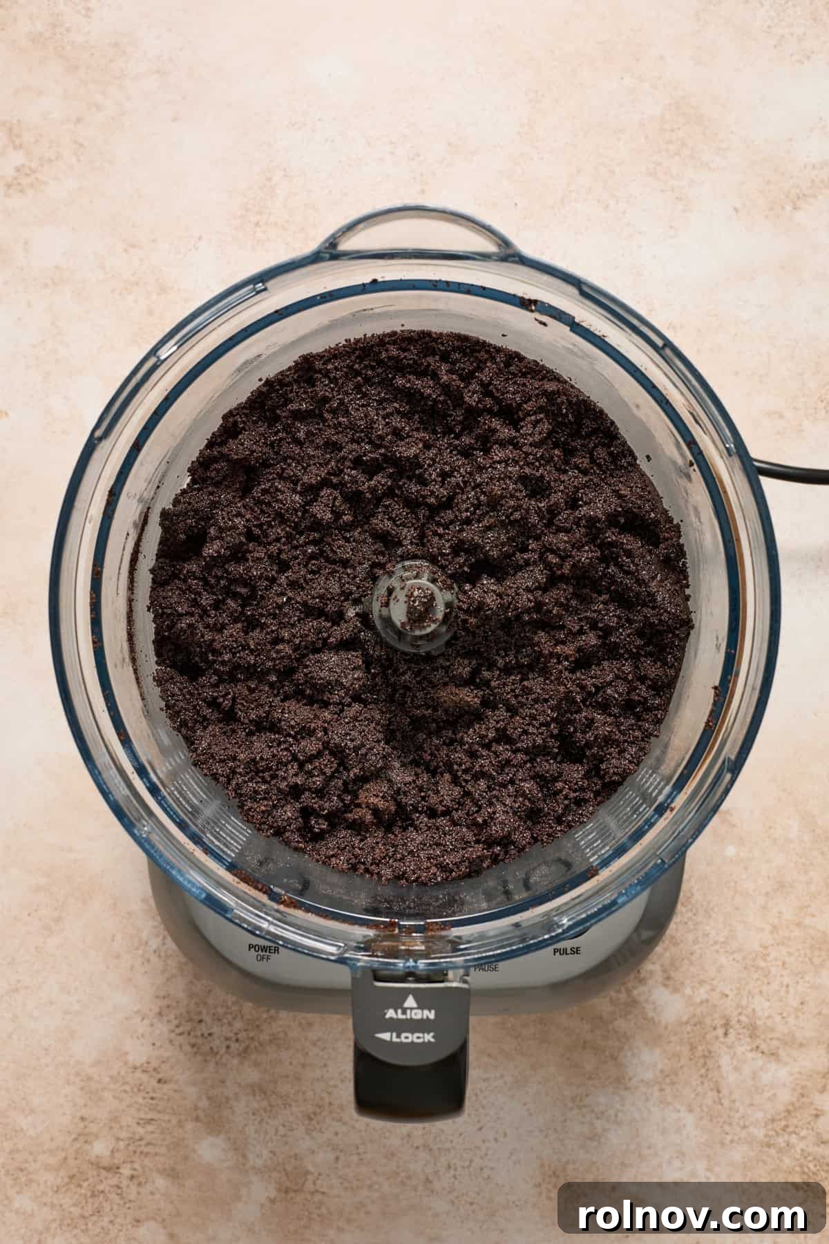 Velvety No Bake Chocolate Pie 7 Chocolate Oreo pie crust mixture in food processor.