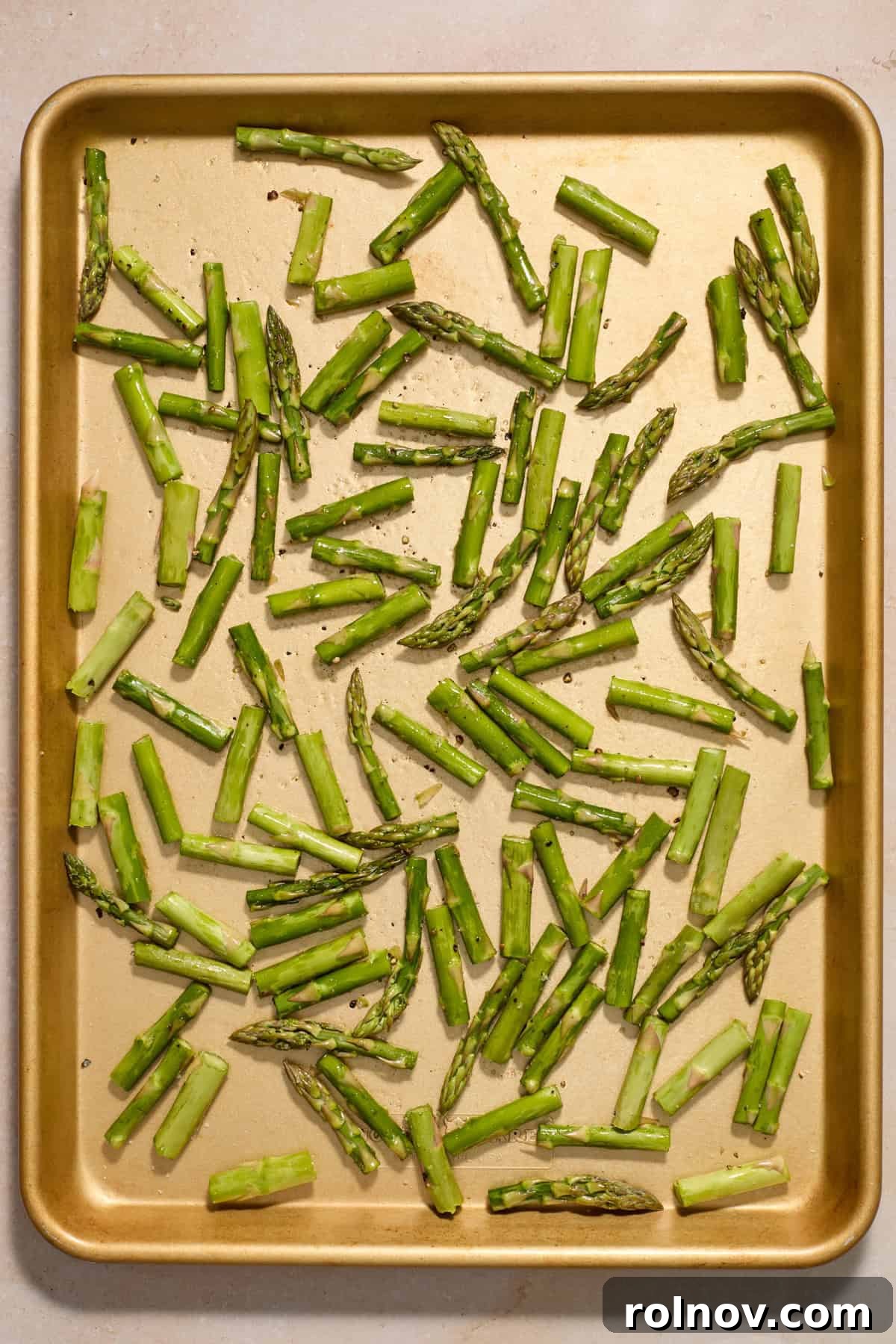 Springtime Pea and Asparagus Risotto 4 Chopped asparagus on sheet pan before roasting.