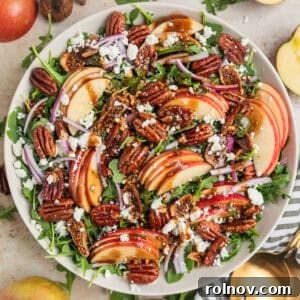 Elevate Your Gnocchi Side Dishes That Shine 12 Apple and arugula salad in bowl with toasted maple pecans, goat cheese, dried figs and balsamic dressing.