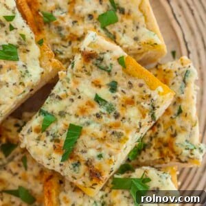 Elevate Your Gnocchi Side Dishes That Shine 14 Cheesy garlic bread on plate topped with chopped basil.