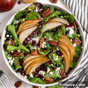 Elevate Your Gnocchi Side Dishes That Shine 6 Roasted pear salad in white salad dish with pecans, goat cheese and more.