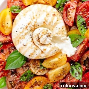 Elevate Your Gnocchi Side Dishes That Shine 8 Burrata and tomatoes on plate with basil and balsamic.