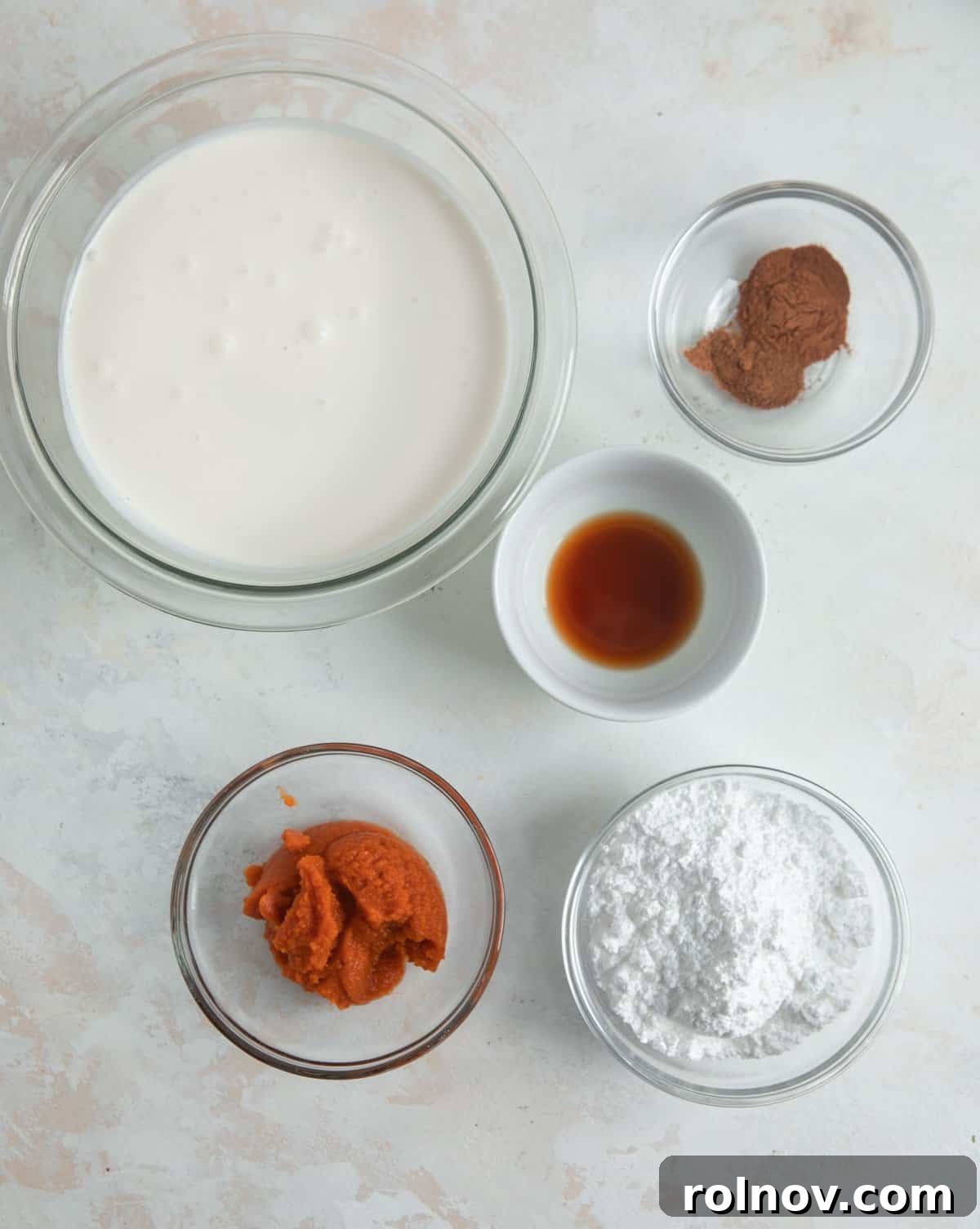 Autumn's Pumpkin Cloud 4 Heavy whipping cream, powdered sugar, pumpkin and other ingredients prepped to make recipe.