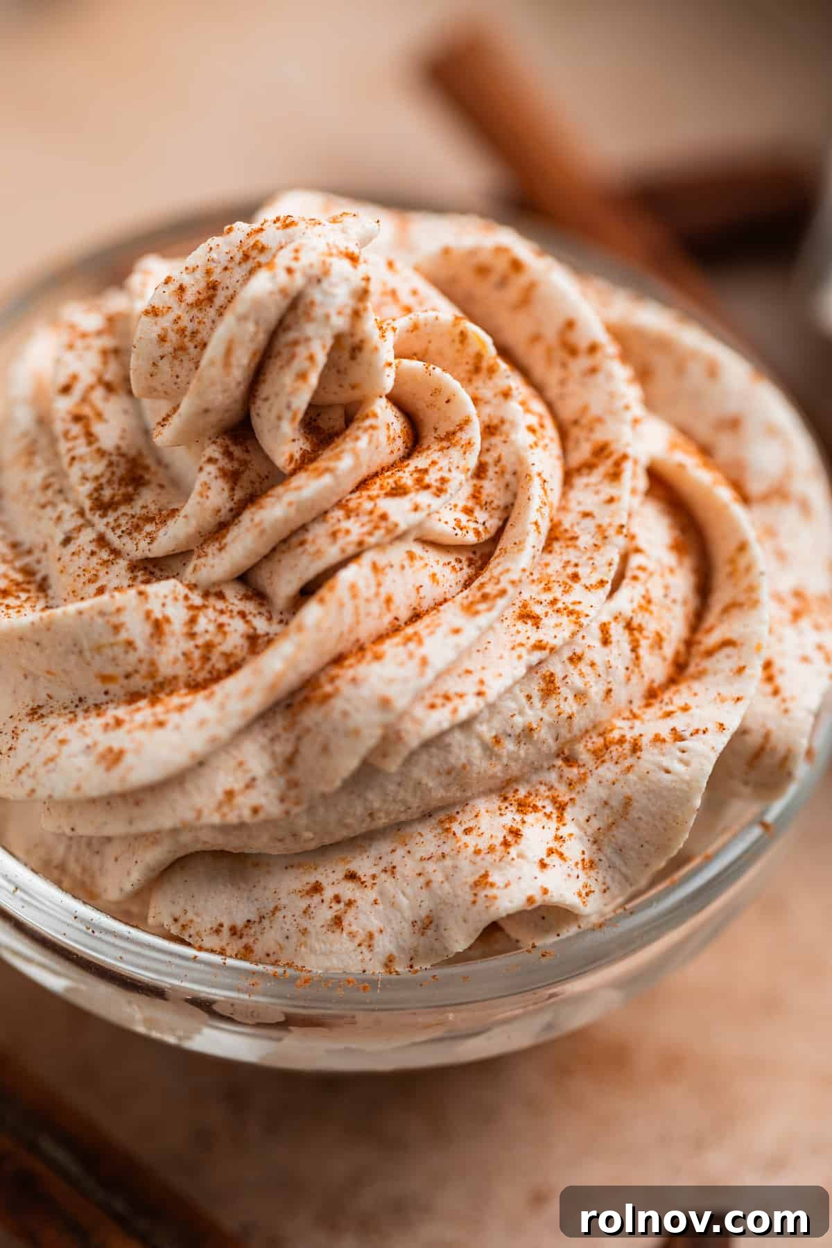 Autumn's Pumpkin Cloud 7 Pumpkin spiced whipped cream piped in glass bowl.